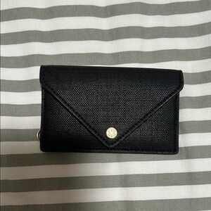 Card case in black by Dagne Dover